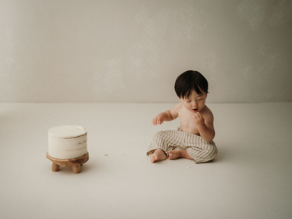 servizio fotografico primo compleanno con torta a Milano