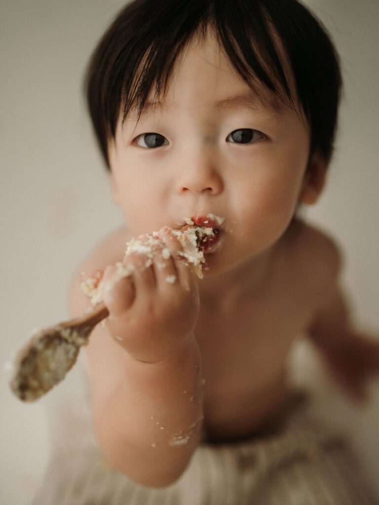 servizio fotografico primo compleanno con torta a Milano